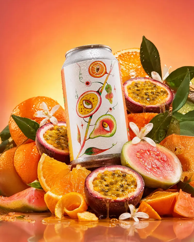 Passionfruit and orange sour surrounded by cut citrus