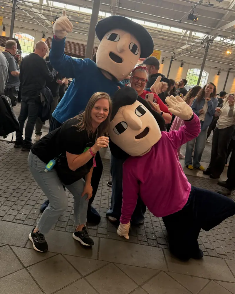 Festival-goers posing with the Samata mascots